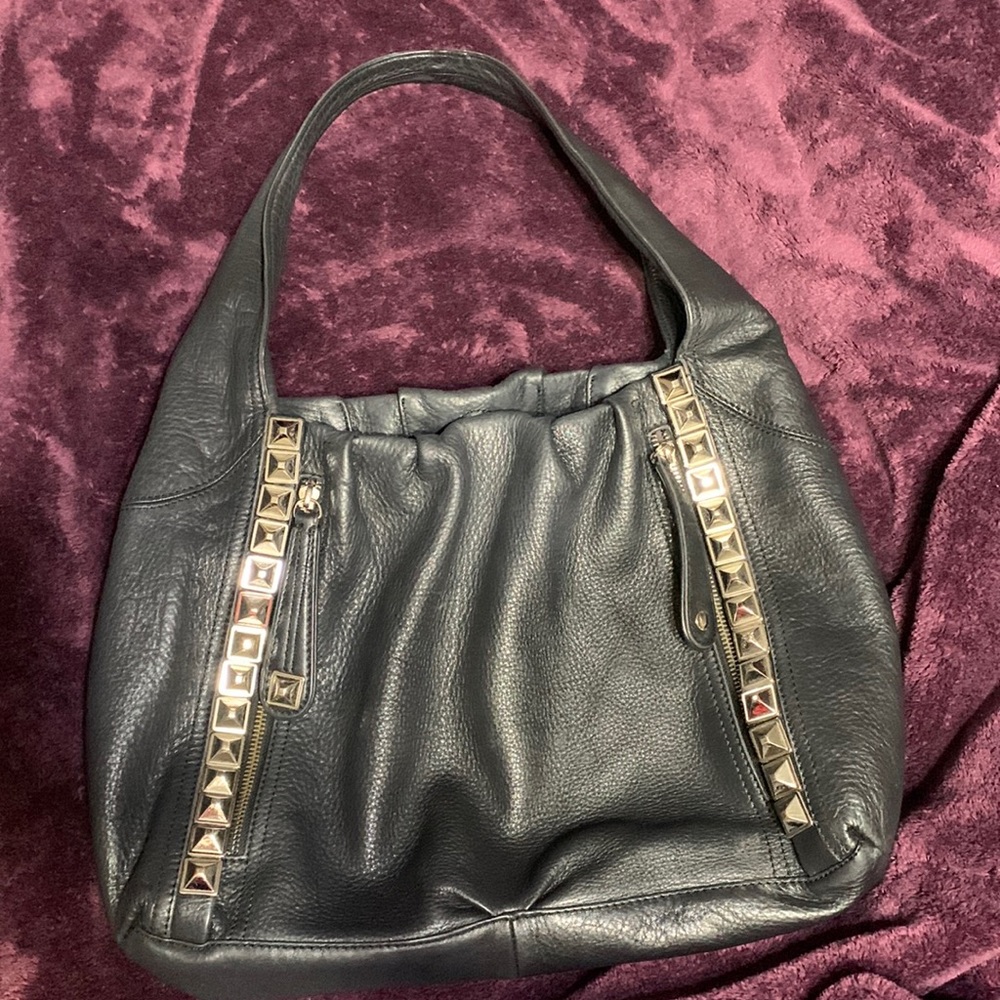 B Makowsky black leather purse with leopard interior.